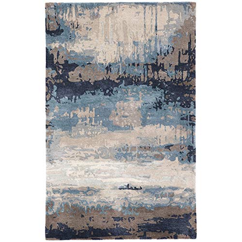Jaipur Living Genesis 5' x 8' Hand Tufted Area Rug in Blue and Brown