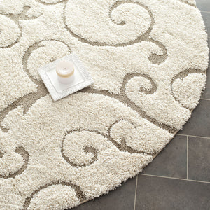 Safavieh Florida Shag Collection SG455-1113 Scrolling Vine Cream and Beige Graceful Swirl Round Area Rug (8' Diameter)