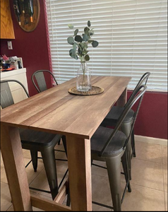 55" Counter Height Dining Table and Set of 4, 24” Metal Barstools with a wood seat, black